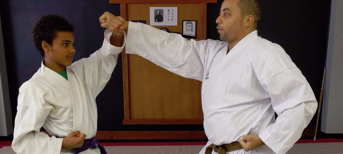 Two students in karate stances.